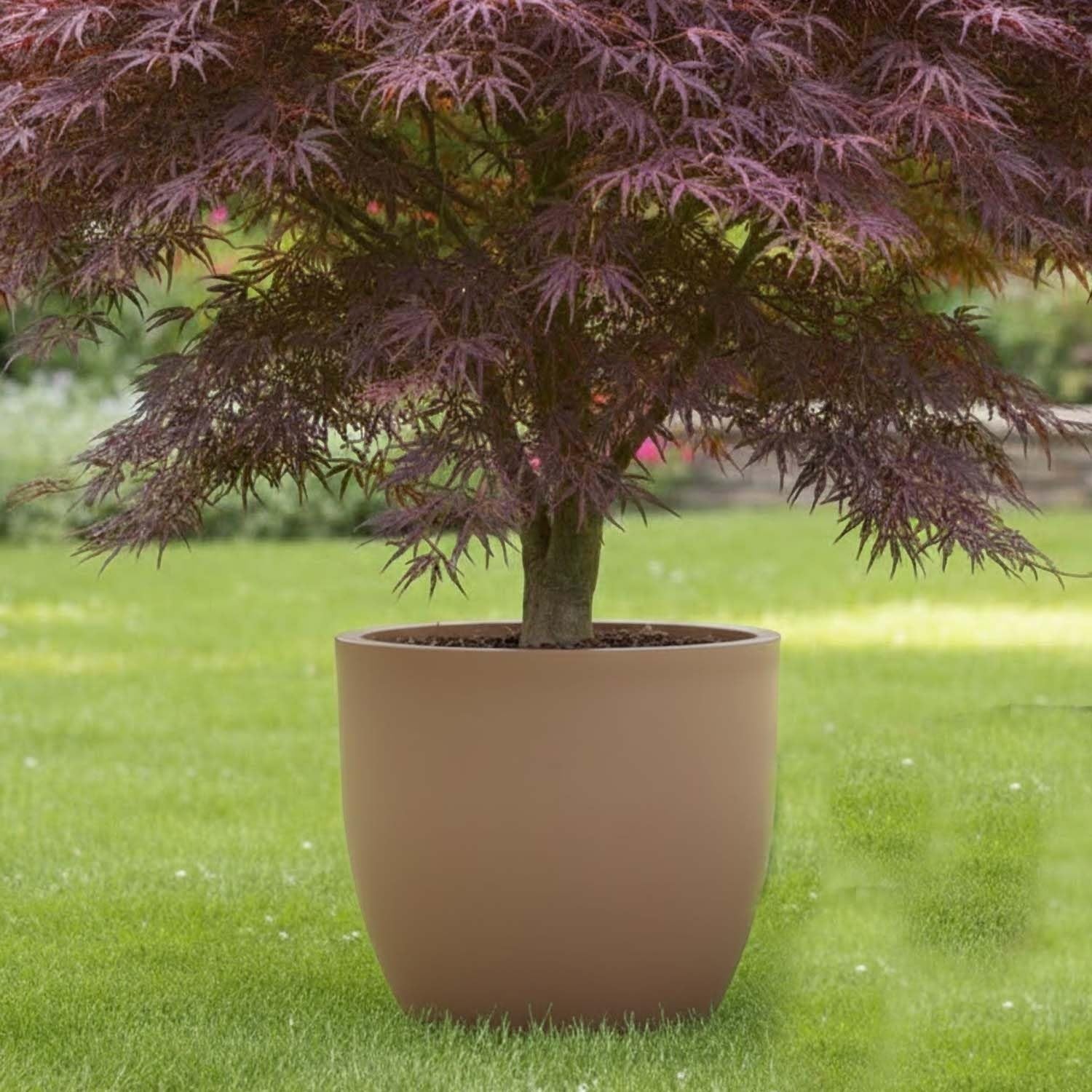 GoHooked 24-inch brown polymer round planter with a modern design, perfect for indoor or outdoor plants.