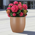GoHooked brown polymer planter with pink hydrangeas, 15-inch round modern design with drainage hole.
