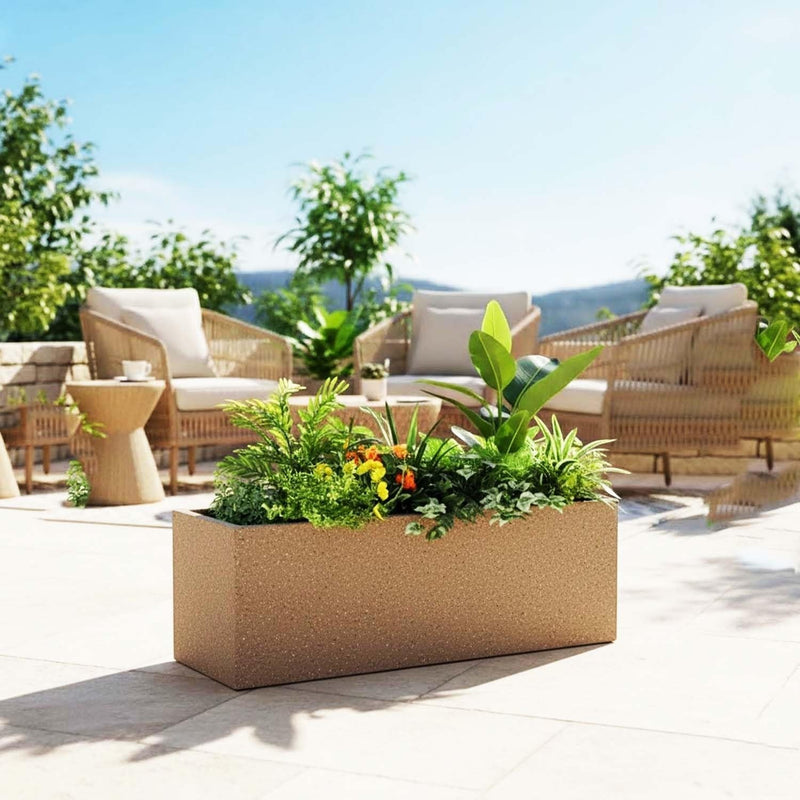 GoHooked brown rectangular polymer planter pot filled with lush green plants and small yellow flowers. Modern outdoor garden decor.
