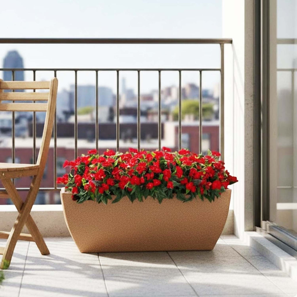 GoHooked brown rectangular polymer planter pot filled with vibrant red flowers on a sunny balcony terrace