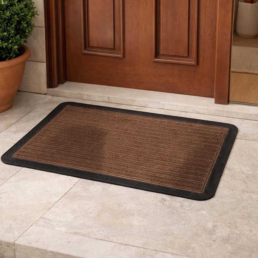 GoHooked brown rubber door mat with ribbed texture and black border placed at a home entrance.