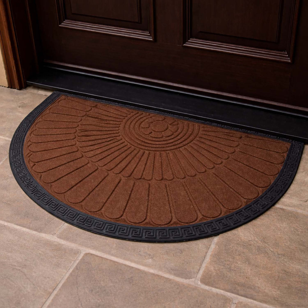 GoHooked semi-circle rubber door mat in brown with a black Greek key border, placed at a home entrance.