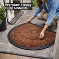 GoHooked brown rubber half circle door mat with embossed lotus floral pattern and anti-slip border on a patio