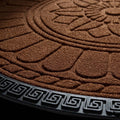 GoHooked brown rubber half circle door mat with embossed lotus floral pattern and geometric border detail.
