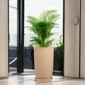 Go Hooked 18-inch tall, lightweight, brown tower planter with a matching saucer tray, featuring a built-in drainage system.