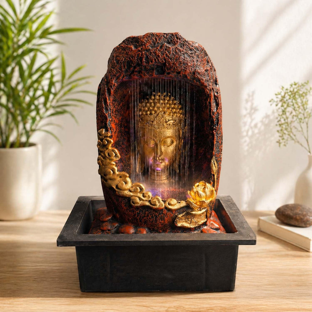 Go Hooked multicolour polyresin Buddha face tabletop fountain with LED light and water cascade. Textured rock design.
