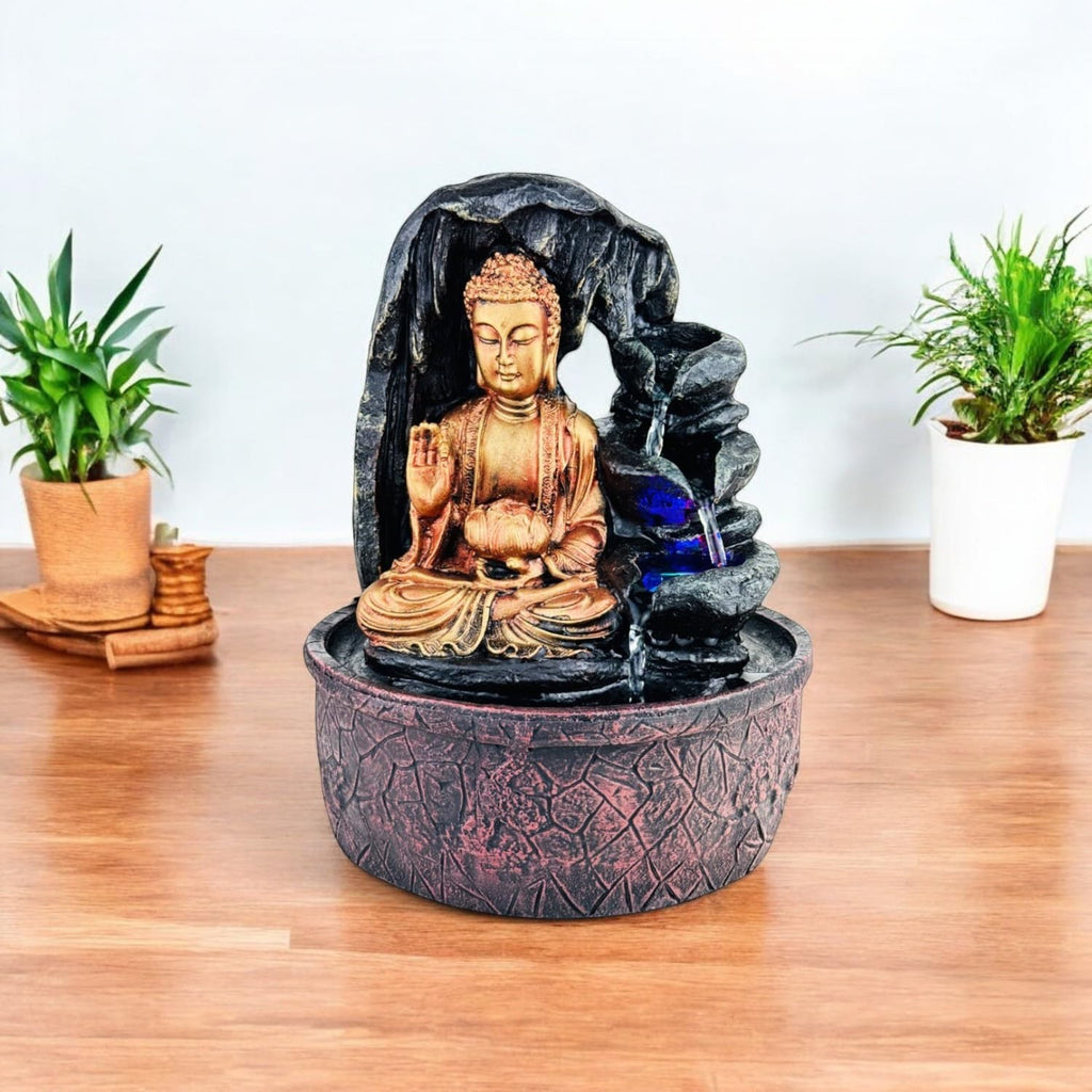 GoHooked Lord Buddha tabletop fountain with LED lights and adjustable water flow, made of polyresin in bronze and black.