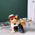 Go Hooked black and white polyresin cat figurine wearing sunglasses and a hat, holding a gold tray with cosmetics.