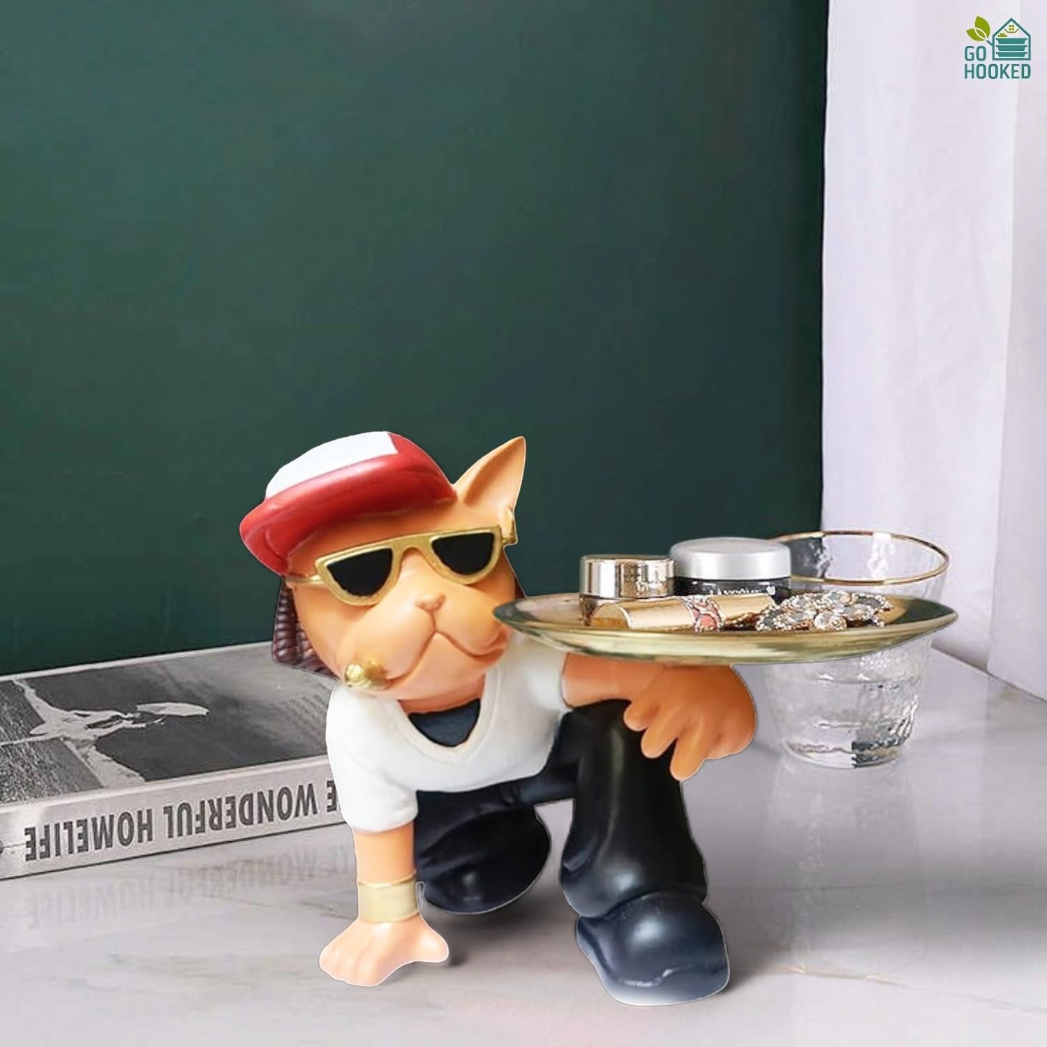 Go Hooked black and white polyresin cat figurine wearing sunglasses and a hat, holding a gold tray with cosmetics.
