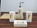 GoHooked 4-piece ceramic bathroom set with abstract colorful geometric pattern. Includes soap dispenser, tumbler, toothbrush holder, and soap dish.