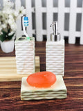 Go Hooked 3-piece ceramic bathroom set in Design-8, includes soap dispenser, toothbrush holder, and soap dish. Modern style.