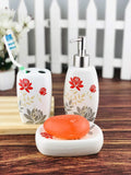 Go Hooked 3-piece ceramic bathroom set with floral design, includes soap dispenser, toothbrush holder, and soap dish.