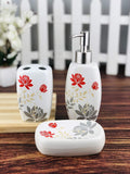 GoHooked 3-piece ceramic bathroom set with red floral design, includes soap dispenser, toothbrush holder, and soap dish.