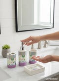 GoHooked 4-piece ceramic bathroom set with floral and stripe pattern, includes soap dispenser, tumbler, toothbrush holder, and soap dish.