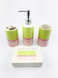 Go Hooked 4-piece ceramic bathroom set with green polka dot and pink paisley design. Includes soap dispenser, tumbler, toothbrush holder, and soap dish.