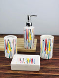 GoHooked 4-piece ceramic bathroom set with a colorful abstract geometric pattern. Includes soap dispenser, tumbler, toothbrush holder, and soap dish.