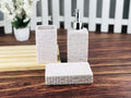 GoHooked 3-piece ceramic bathroom set in light pink with a textured geometric pattern. Includes soap dispenser, toothbrush holder, and soap dish.