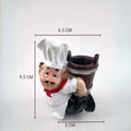 Go Hooked white and brown resin chef toothpick holder with red scarf, 8cm tall. Fun kitchen decor.