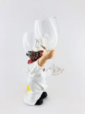 GoHooked white resin chef wine glass holder with curly brown hair and red scarf, holding two wine glasses.