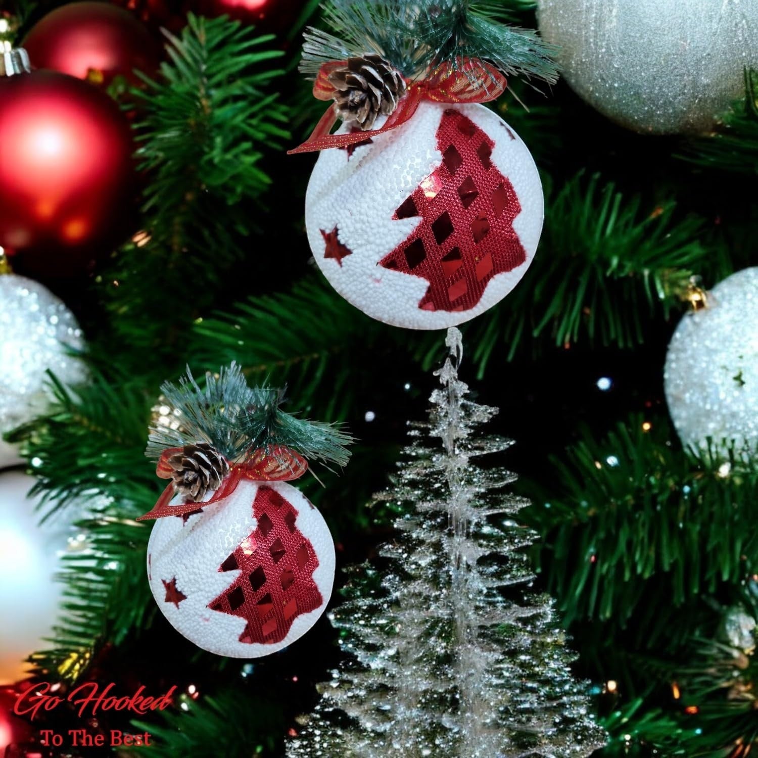 Go Hooked multicolor Christmas tree ornaments with glittery red trees and pinecone accents.