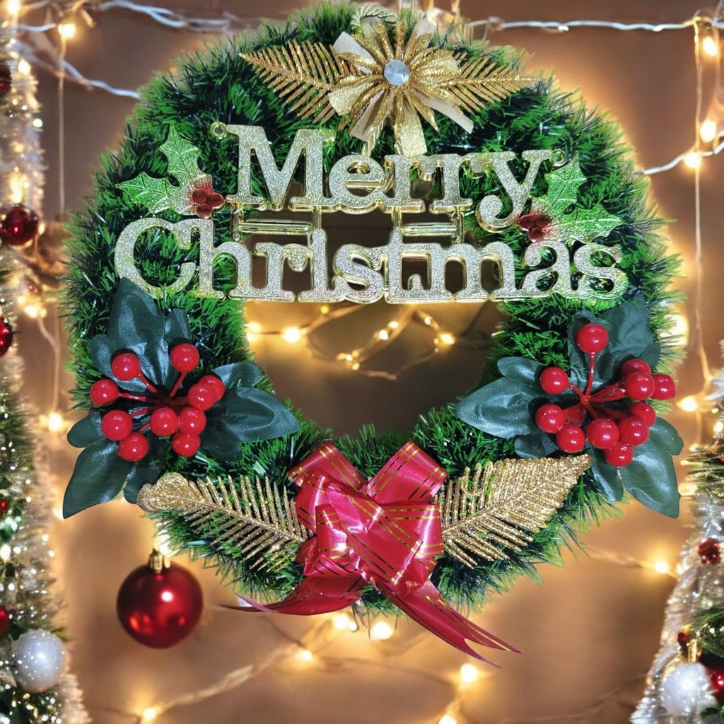 GoHooked green Christmas wreath with "Merry Christmas" text, red berries, gold accents, and a red bow.