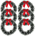 GoHooked artificial pine Christmas wreaths with red bows, 20cm diameter, green and white tinsel, indoor decor.