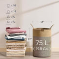 GoHooked cotton rope laundry bag in brown and black with 75L capacity shown next to a stack of folded clothing