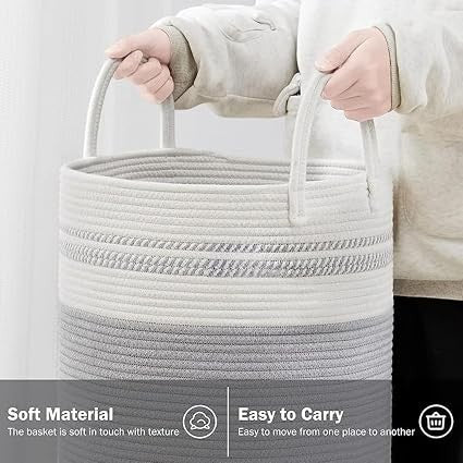 GoHooked cotton rope laundry basket in grey and white with sturdy handles for easy carrying in a nursery or bedroom.