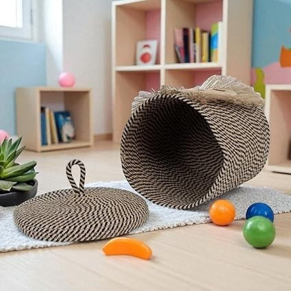 GoHooked cotton rope storage basket with lid in a black and white woven pattern, placed in a child's playroom.