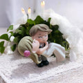 Go Hooked romantic bride and groom figurine in black and white, made of resin, perfect for cake decoration or home decor.