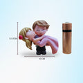 GoHooked romantic couple figurine of groom carrying bride in pink dress, resin, 5.5cm tall.