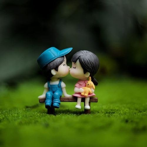 GoHooked resin couple figurines kissing on a bench, boy in blue overalls & cap, girl with bunny. Romantic decor.