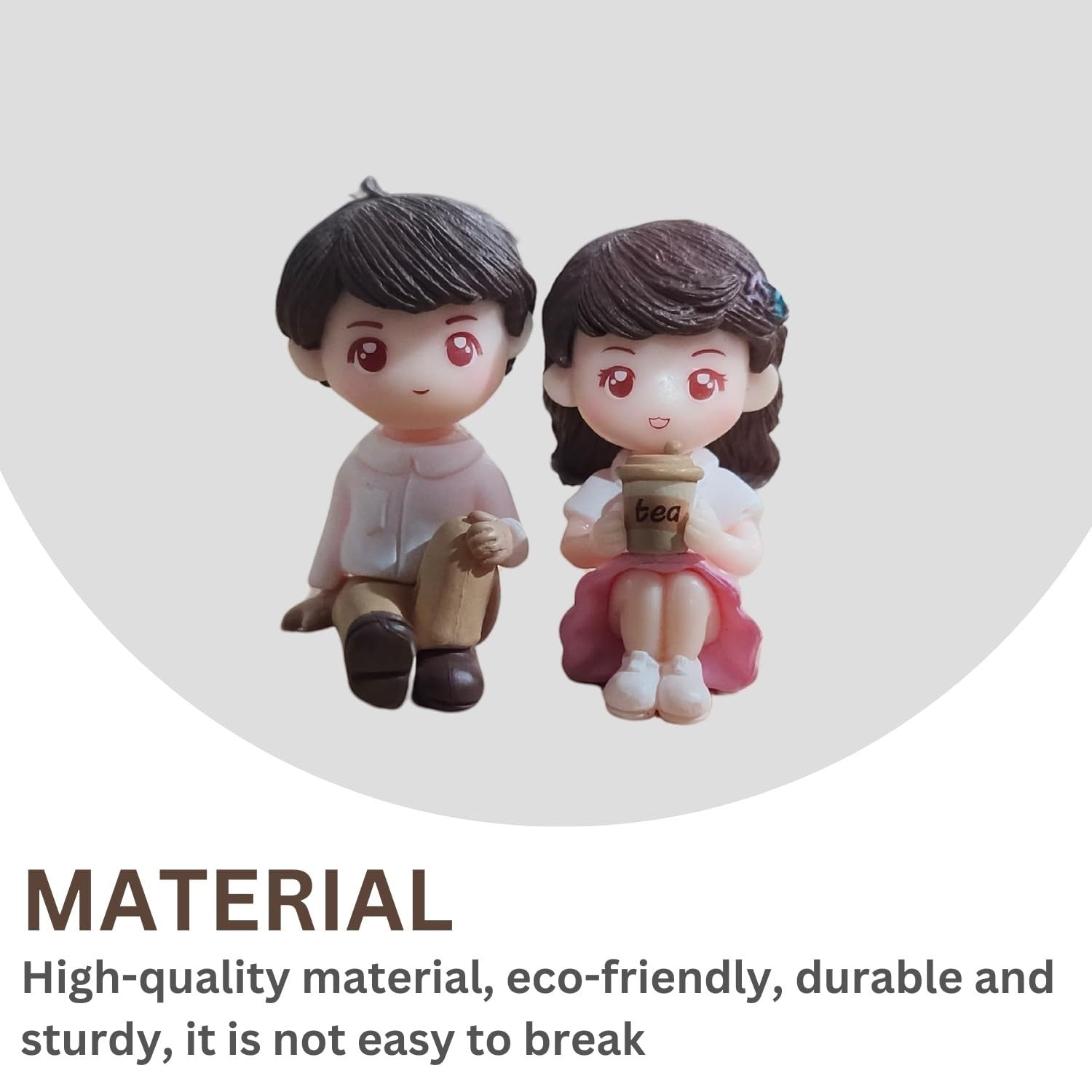 Go Hooked romantic couple figurines, boy in pink shirt and tan pants, girl in pink dress holding a tea cup. Resin material.