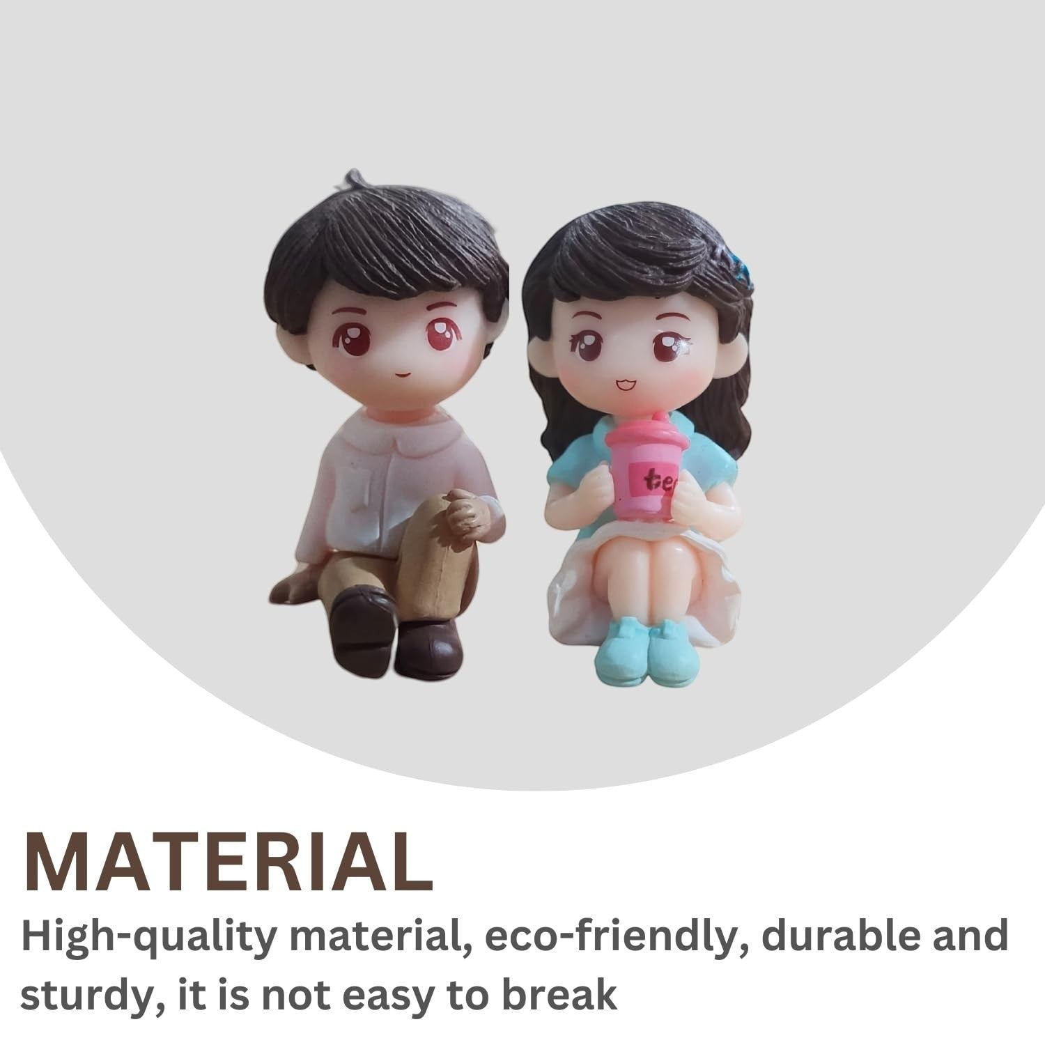 GoHooked romantic couple figurines, one boy in a pink shirt and tan pants, one girl in a blue dress holding a pink cup. Resin material.