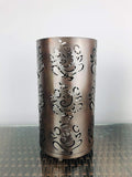 GoHooked dark brown metal table lamp with intricate Ganesha cutouts and an off-white shade. Perfect for bedside or living room decor.