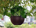 GoHooked dark brown plastic hanging pot with woven rattan look, 7.1 inch diameter, for indoor/outdoor use.