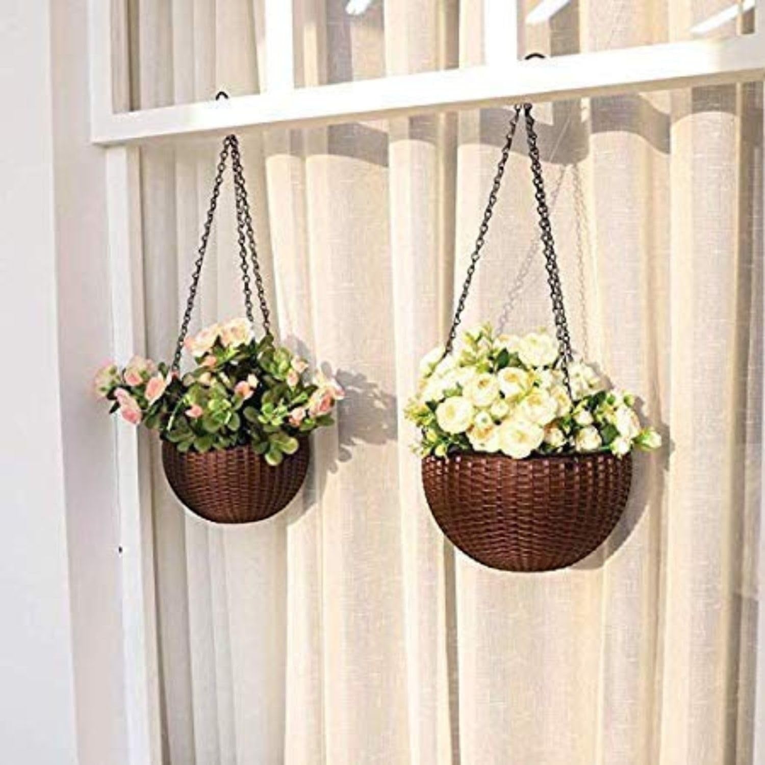 GoHooked dark brown plastic hanging planter with woven texture, 7.1 inch diameter, holding pink and white flowers.