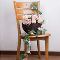 GoHooked dark brown plastic hanging pot with woven texture, 7.1 inch diameter, holding pink and cream roses.