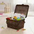 GoHooked dark brown plastic picnic basket with lid and handle, filled with toys and diapers.