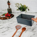 Go Hooked dark grey plastic storage bin with perforated sides, perfect for home or kitchen organization.