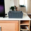 Go Hooked dark grey plastic storage bin with perforated sides, ideal for home or office organization.