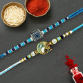 GoHooked designer rakhis with blue beads, pearl accents, and a square evil eye charm or a sun deity motif.