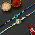 GoHooked designer rakhis with blue beads, evil eye charm, and Krishna motif. Includes roli and chawal.