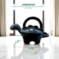 GoHooked gray plastic dinosaur watering can, 1 liter capacity, fun for kids' gardening.