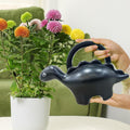 GoHooked gray plastic dinosaur watering can for kids, 1 liter capacity, for house and garden plants.