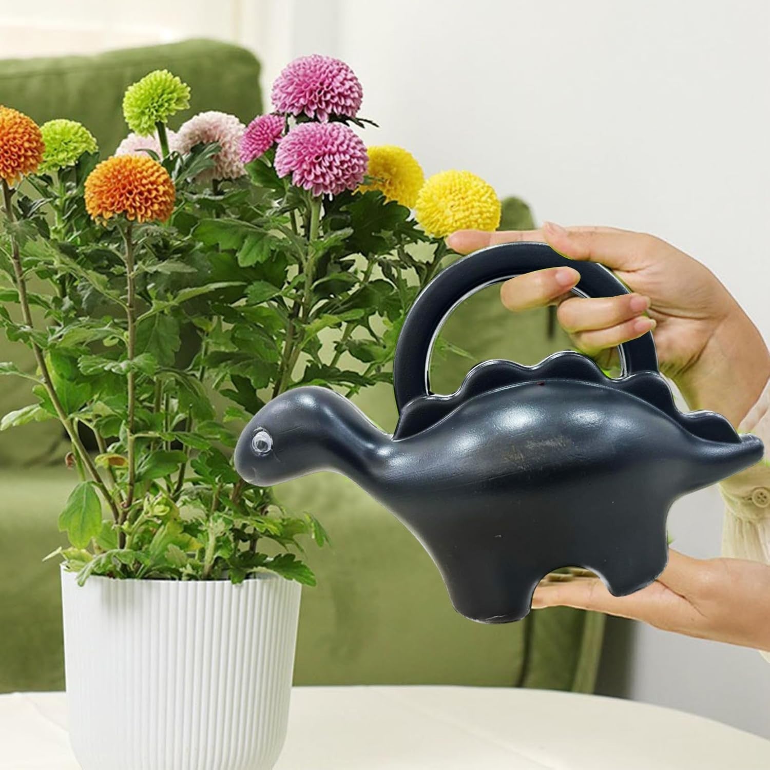 GoHooked gray plastic dinosaur watering can for kids, 1 liter capacity, for house and garden plants.