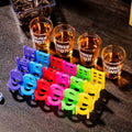 GoHooked Drunken Tower stacking chairs game set with 18 colorful plastic stools and 4 shot glasses for adult parties.