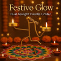GoHooked dual tealight holder in matte gold finish, shaped like a running figure on a triangular base. Festive decor.