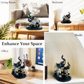 GoHooked black and gold polyresin elephant figurine with trunk up, detailed royal embellishments. Symbol of prosperity.
