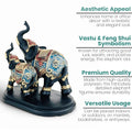 GoHooked black and gold polyresin elephant figurine with blue and red ornate saddle, trunk up, on a black base.